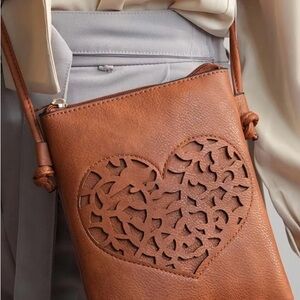 MKF Chic Brown Heart Cutout Crossbody Bag. NWT.